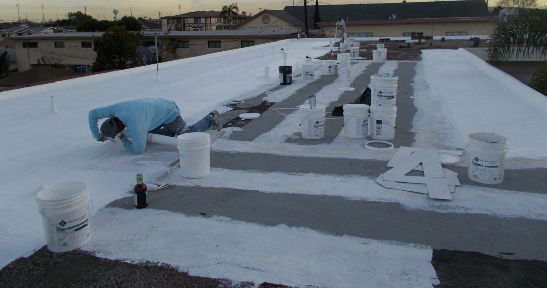 SureCoat Roof Install over gravel roofing